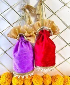 Round velvet Potli with tassel